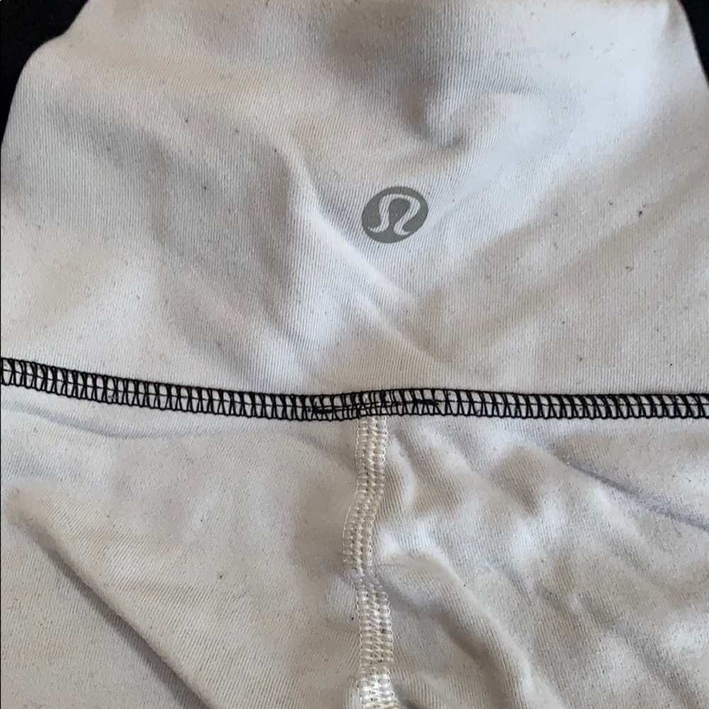 White Lululemon leggings with black sides